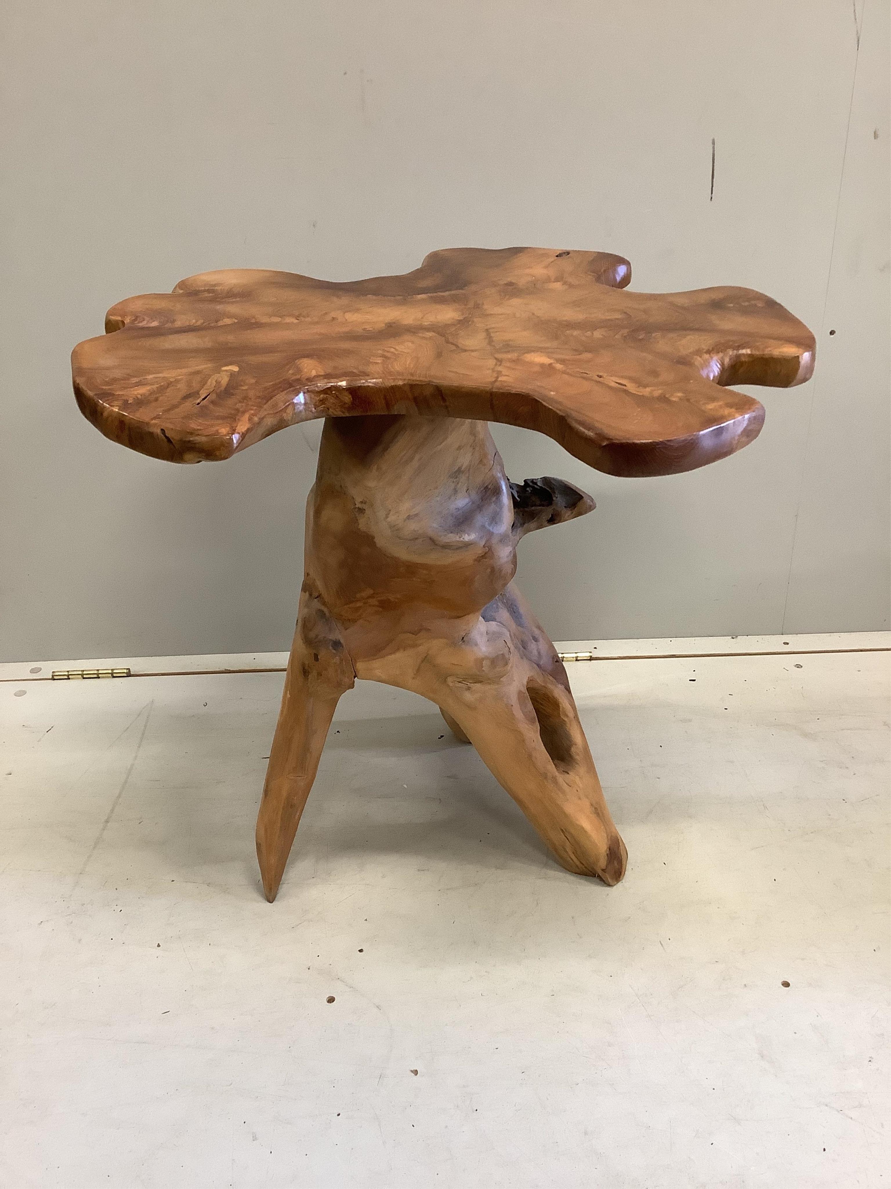 Two hand carved wood 'rustic' occasional tables, largest width 64cm, depth 64cm, height 59cm